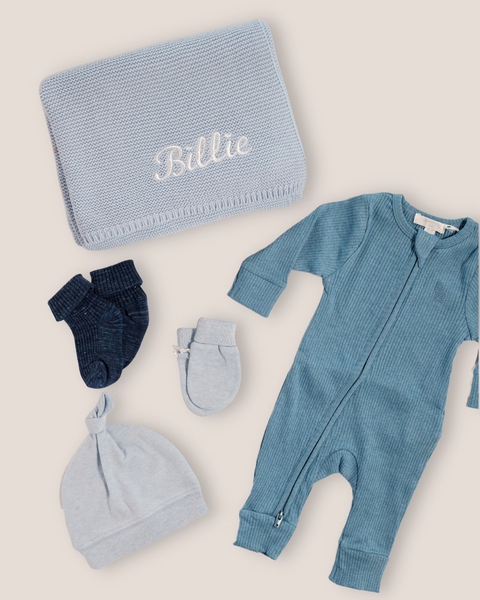 colour:lake-blue | Flat-lay of personalised lake blue welcome baby gift set