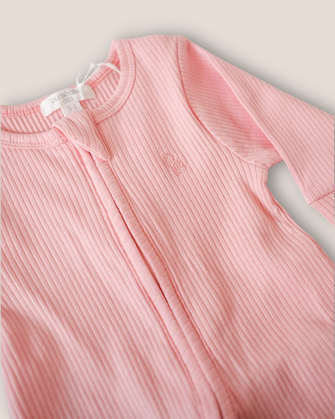 colour:dusty-rose | Texture detail of dusty rose pink ribbed zip baby romper