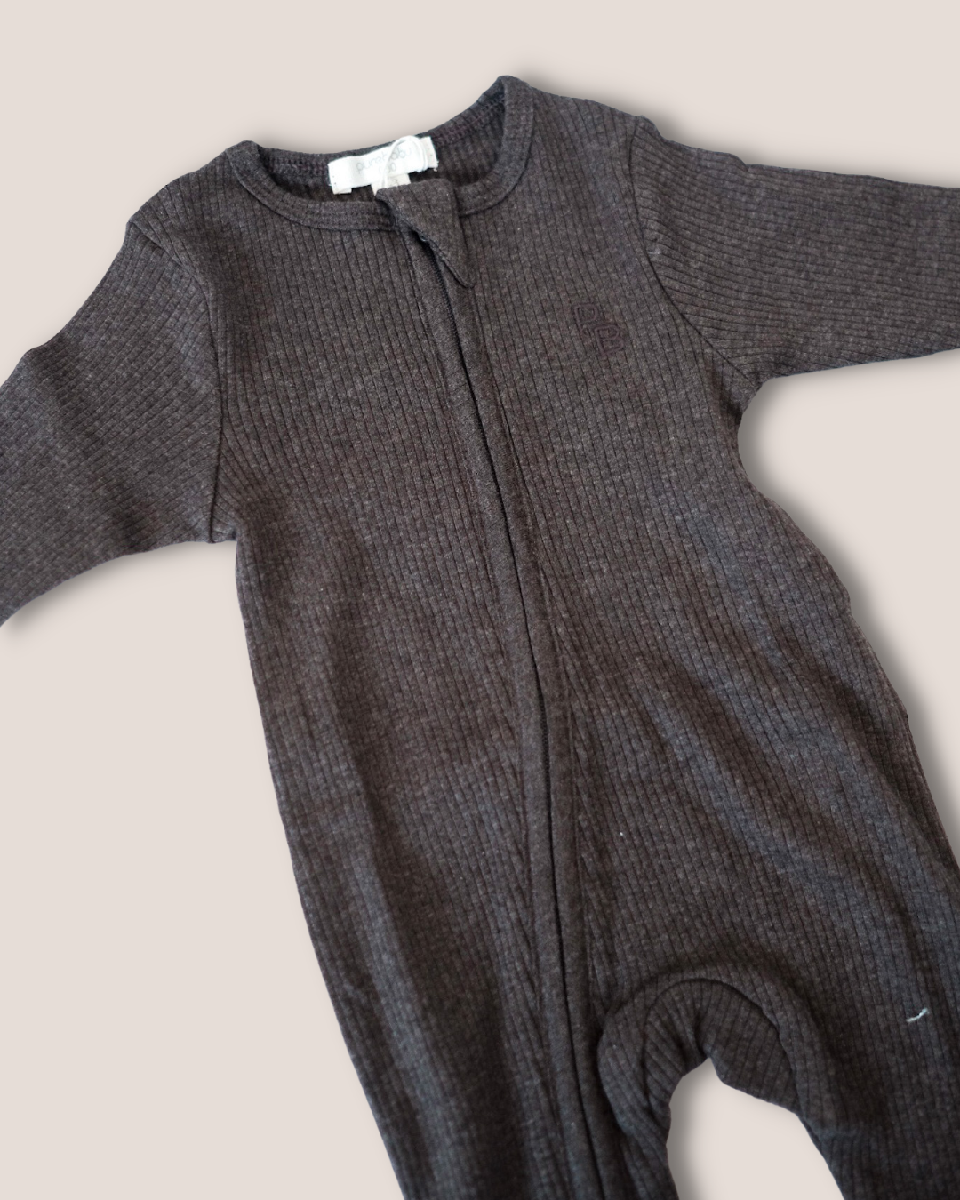 colour:charcoal | Close-up of charcoal footed zip baby romper