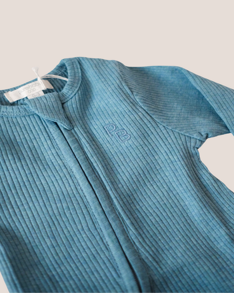 colour:lake-blue | Texture detail of lake blue ribbed zip baby romper