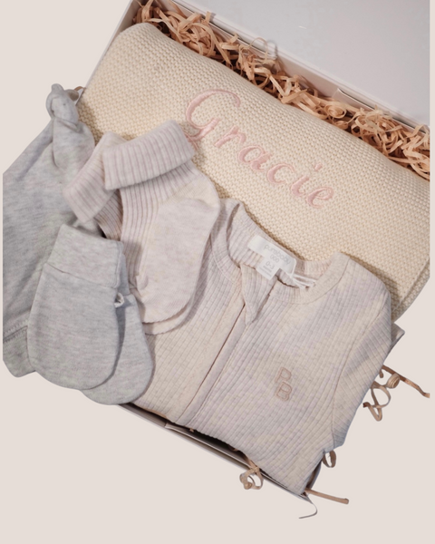colour:wheat | Close-up of wheat welcome baby gift box with personalised Gracie knit blanket